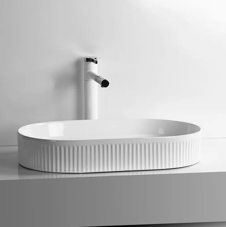 Раковина накладная Ceruttispa CR8009 овальная ребристая, белая, 58х36х10 см
