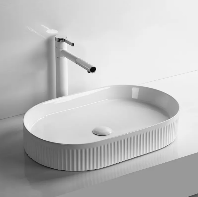 Раковина накладная Ceruttispa CR8009 овальная ребристая, белая, 58х36х10 см