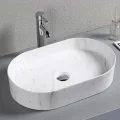 Раковина накладная Ceruttispa CR0055B MMW1 мрамор белый матовый, овальная, 50х35х12 см