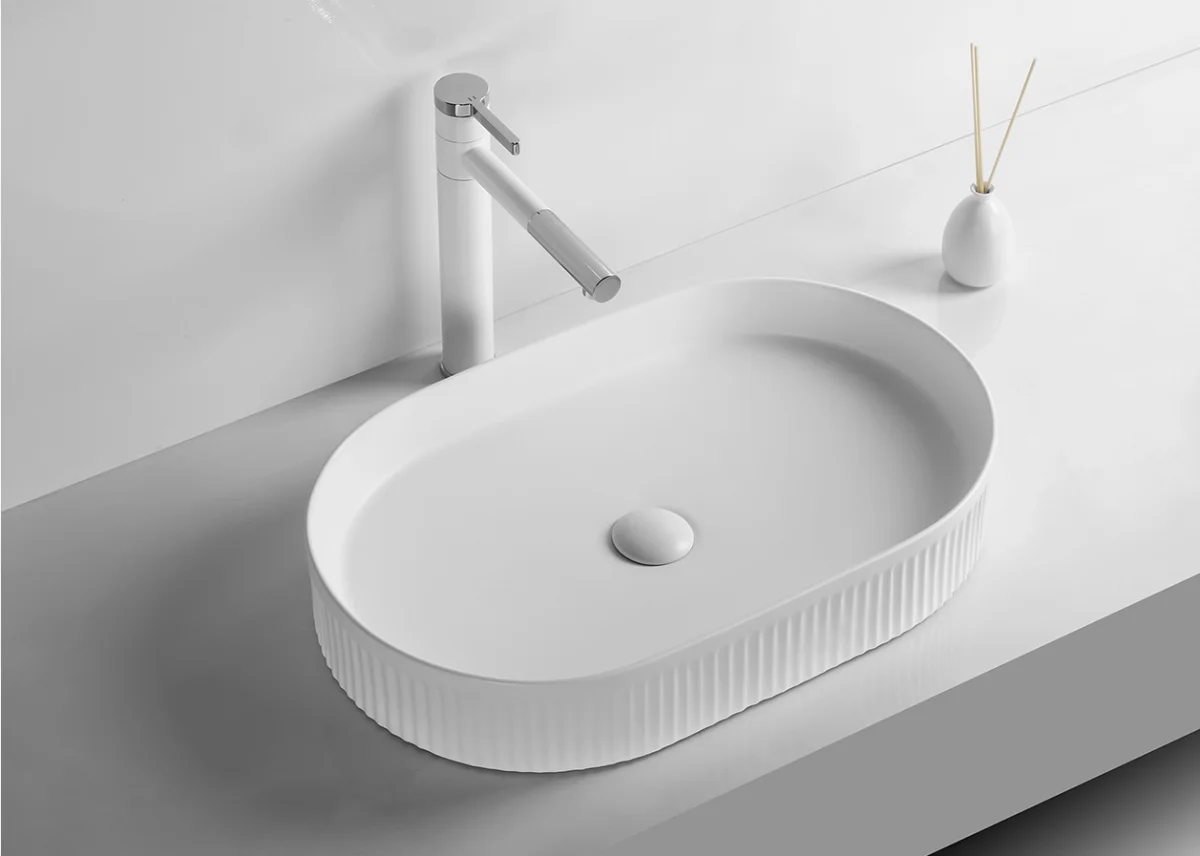 Раковина накладная Ceruttispa CR8009 овальная ребристая, белая, 58х36х10 см